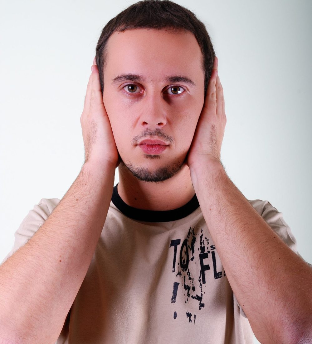 Handsome man expressing his inner feelings Handsome man expressing his inner feelings